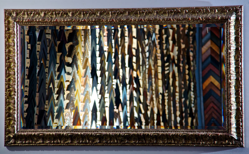 Picture of large mirror with elaborate gilt frame