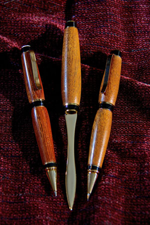 Hand carved wooden pens and letter opener by Randy Bonella