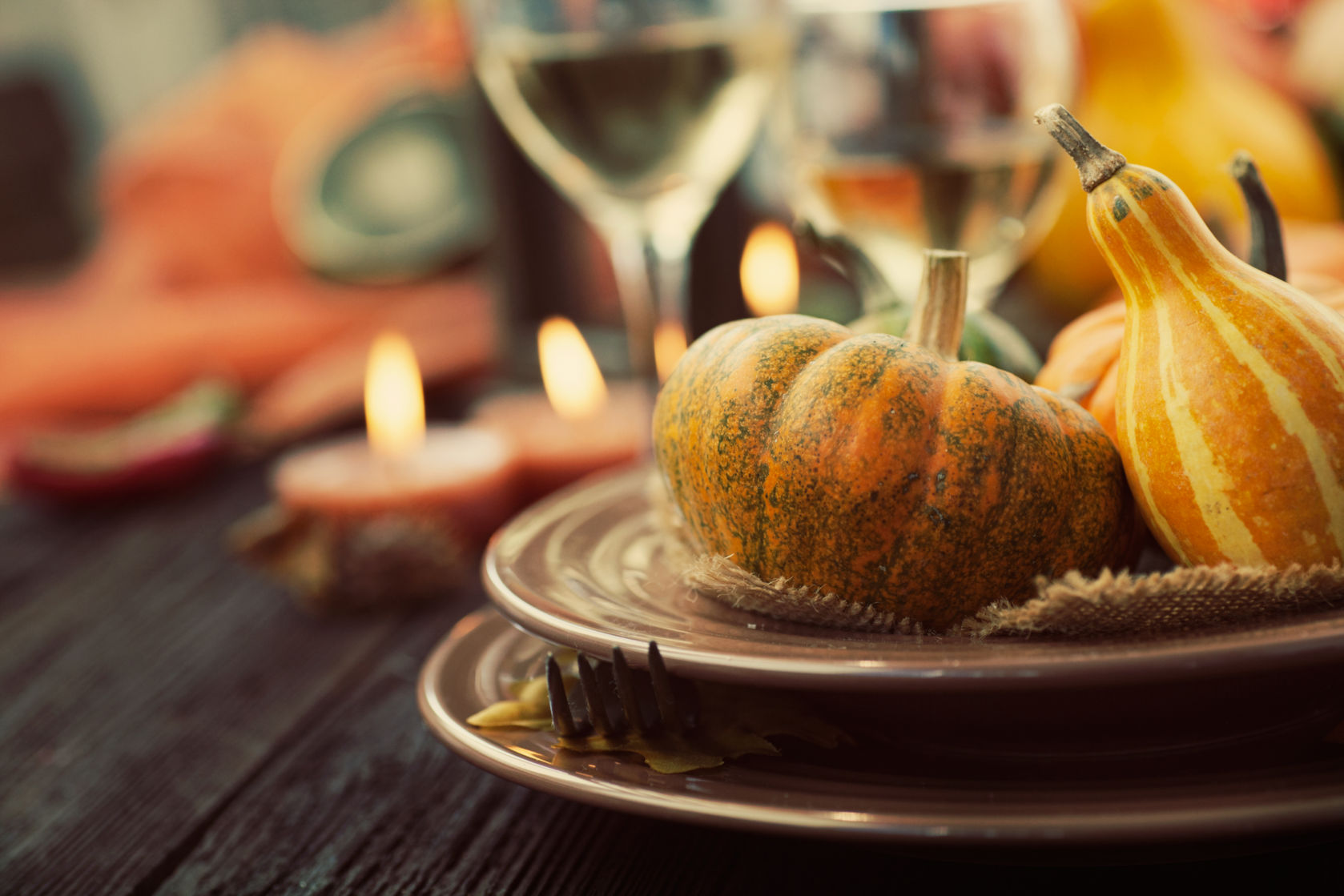 Autumn table setting with pumpkins.