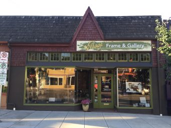 Front of Village Frame & Gallery, which has just been repainted and gotten a new sign