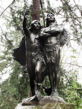 Sculpture of two native american men looking into the distance