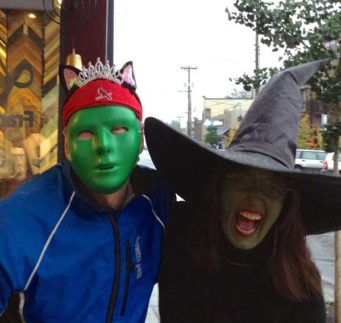 Scott and Beth in Halloween costumes. Beth is dressed as Ephelba the witch.