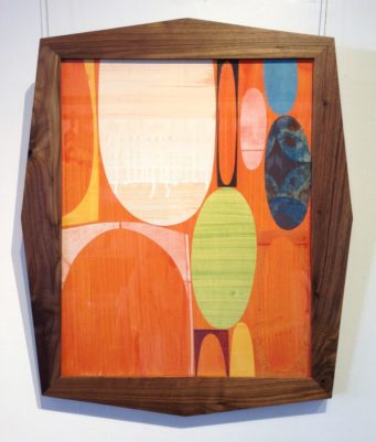 Mid-century modern art in wood frame with curved edges