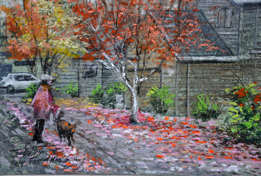 Landscape of autumn street. A woman and dog are walking past a building under trees with colorful leaves.