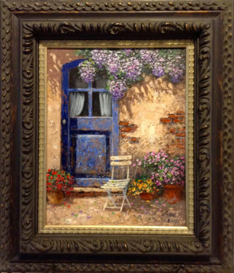 Framed oil painting of small patio outside blue door. A chair and pots of colorful flowers are arranged on the patio.